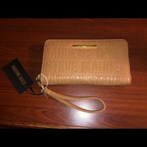 a brand new Steve Madden wristlet!